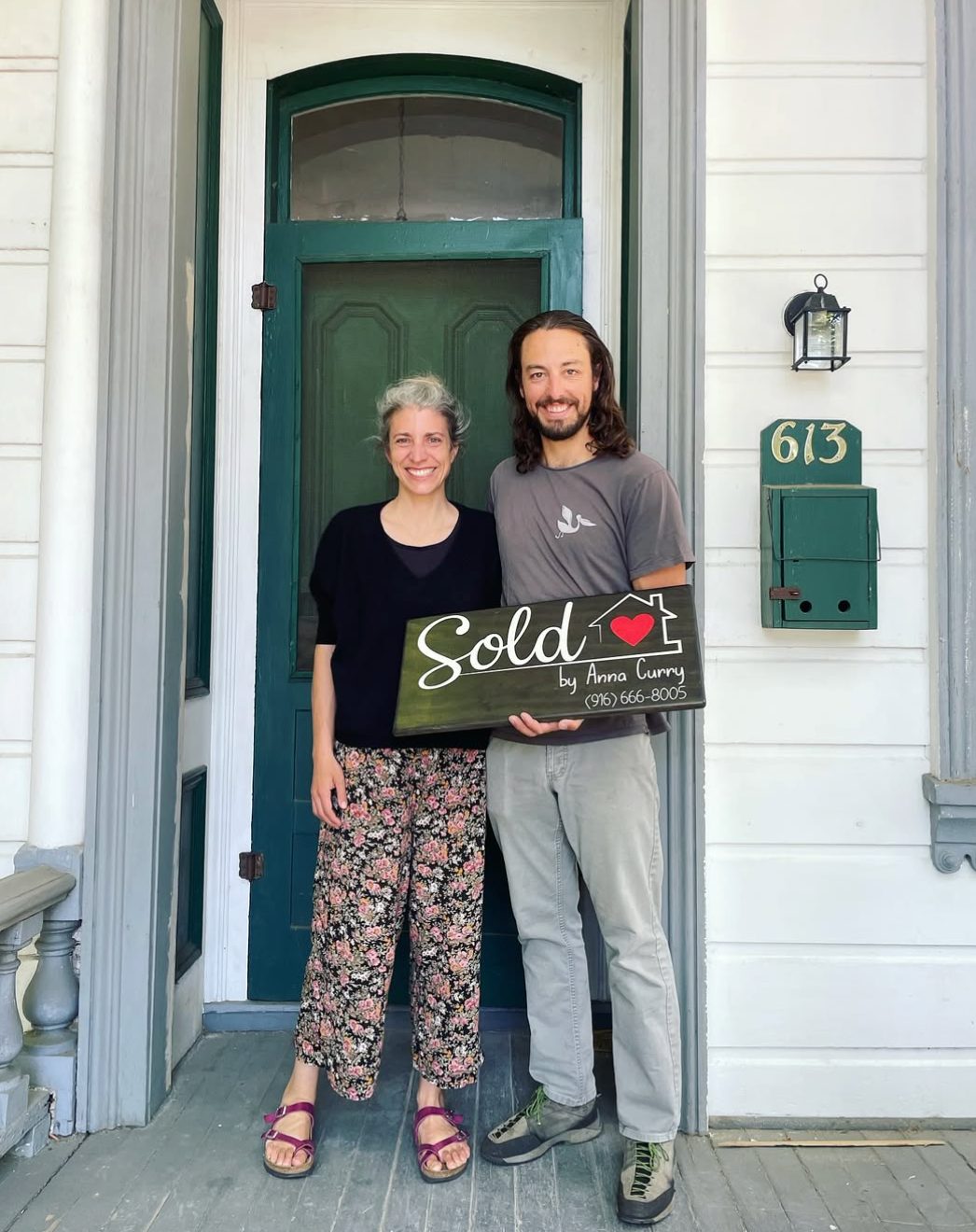 Emilie and family at their new home